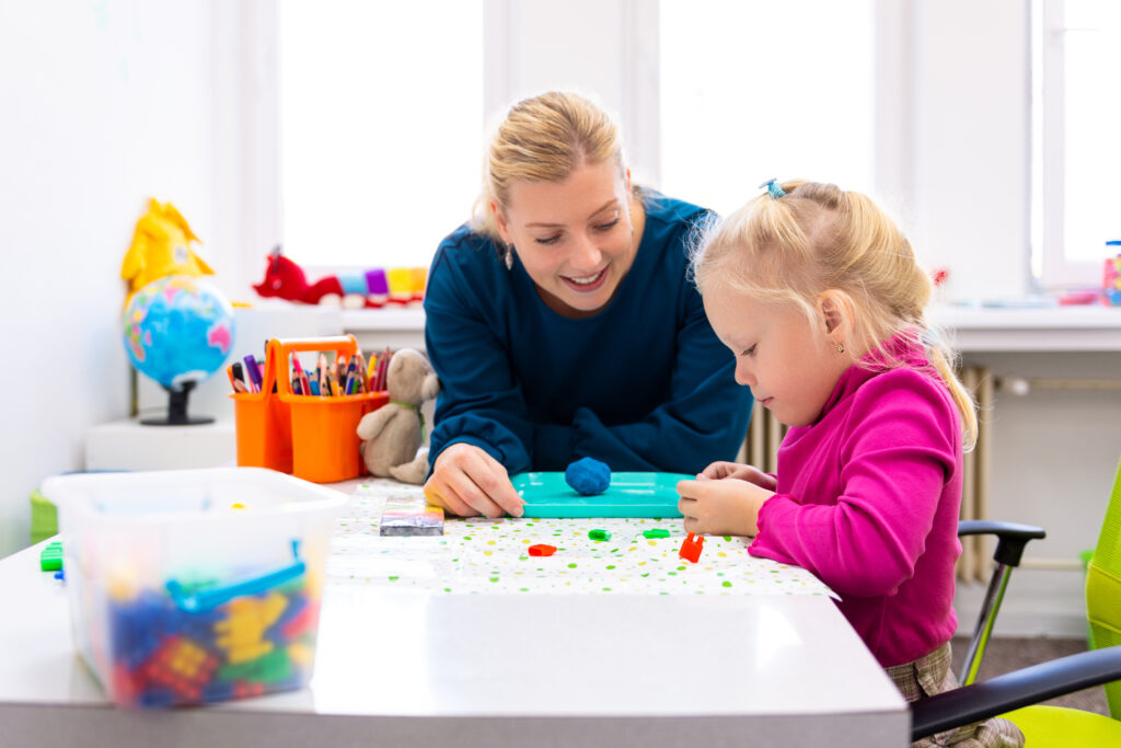 adult professional working in childcare early learning and childcare sector